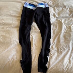 Lululemon leggings with ruching on the side.